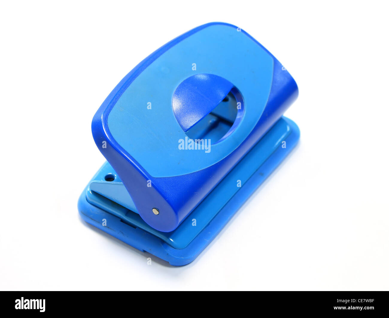 Circle shape hole punch on white background Stock Photo - Alamy