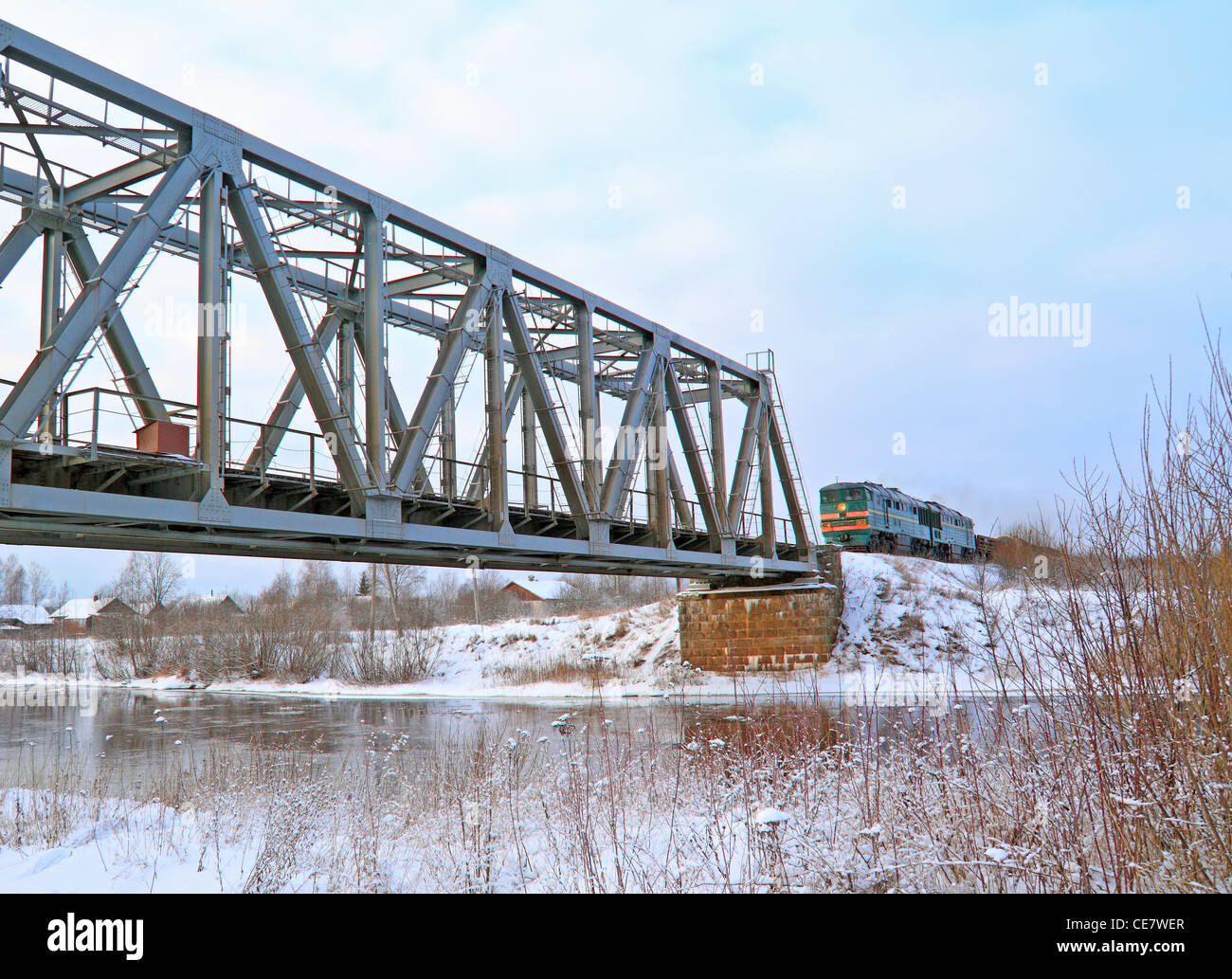 train on bridge through river Stock Photo