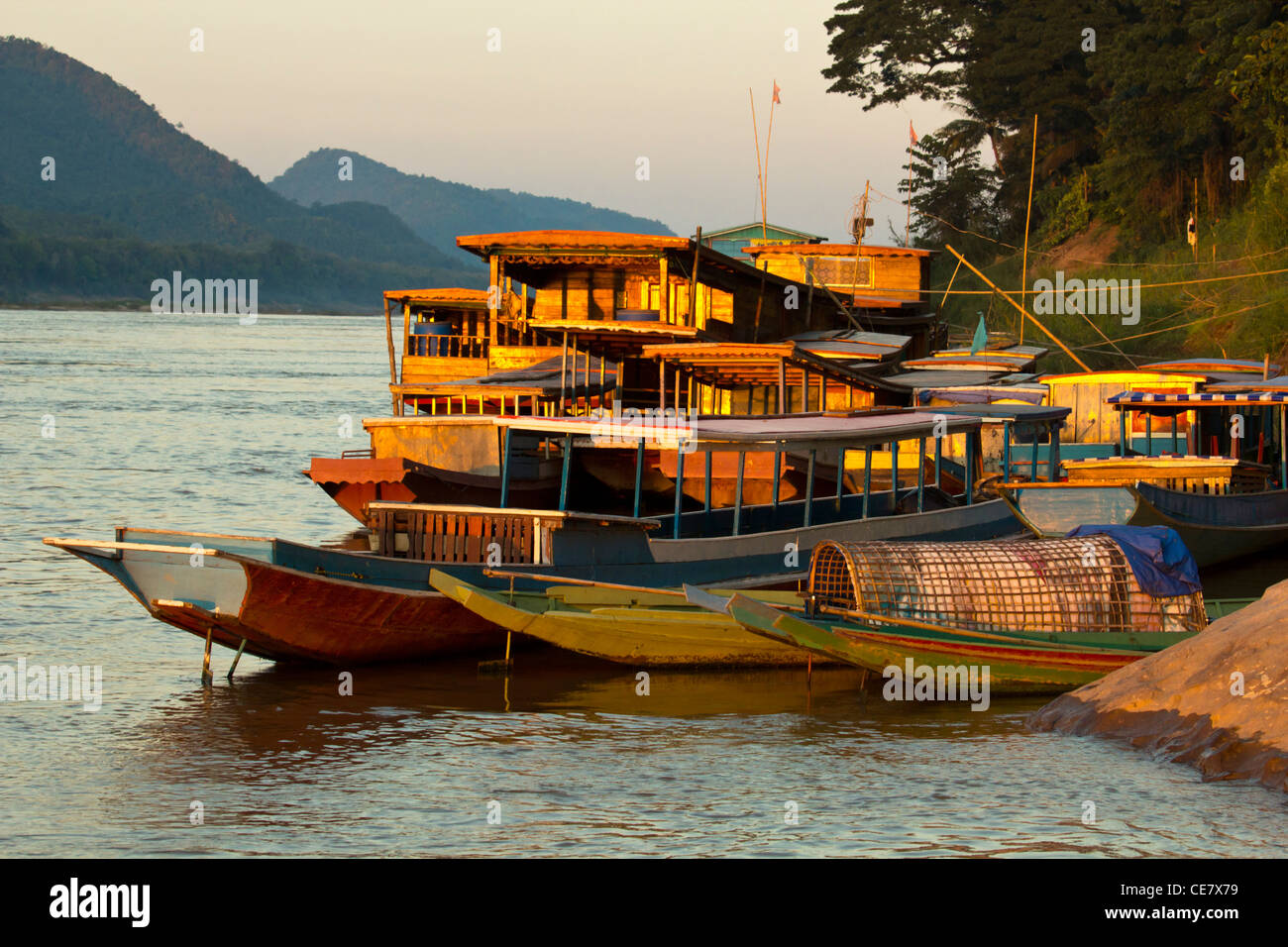 Ships anchored on the river bank of mekong river Stock Photo