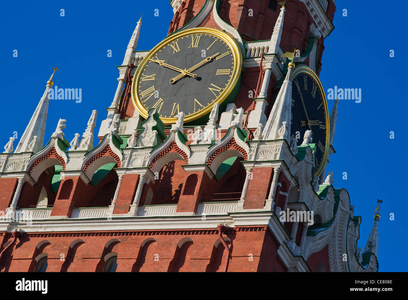 Closeup view of Spasskaya, Spassky, Savior tower of Moscow Kremlin against deep-blue sky Stock Photo