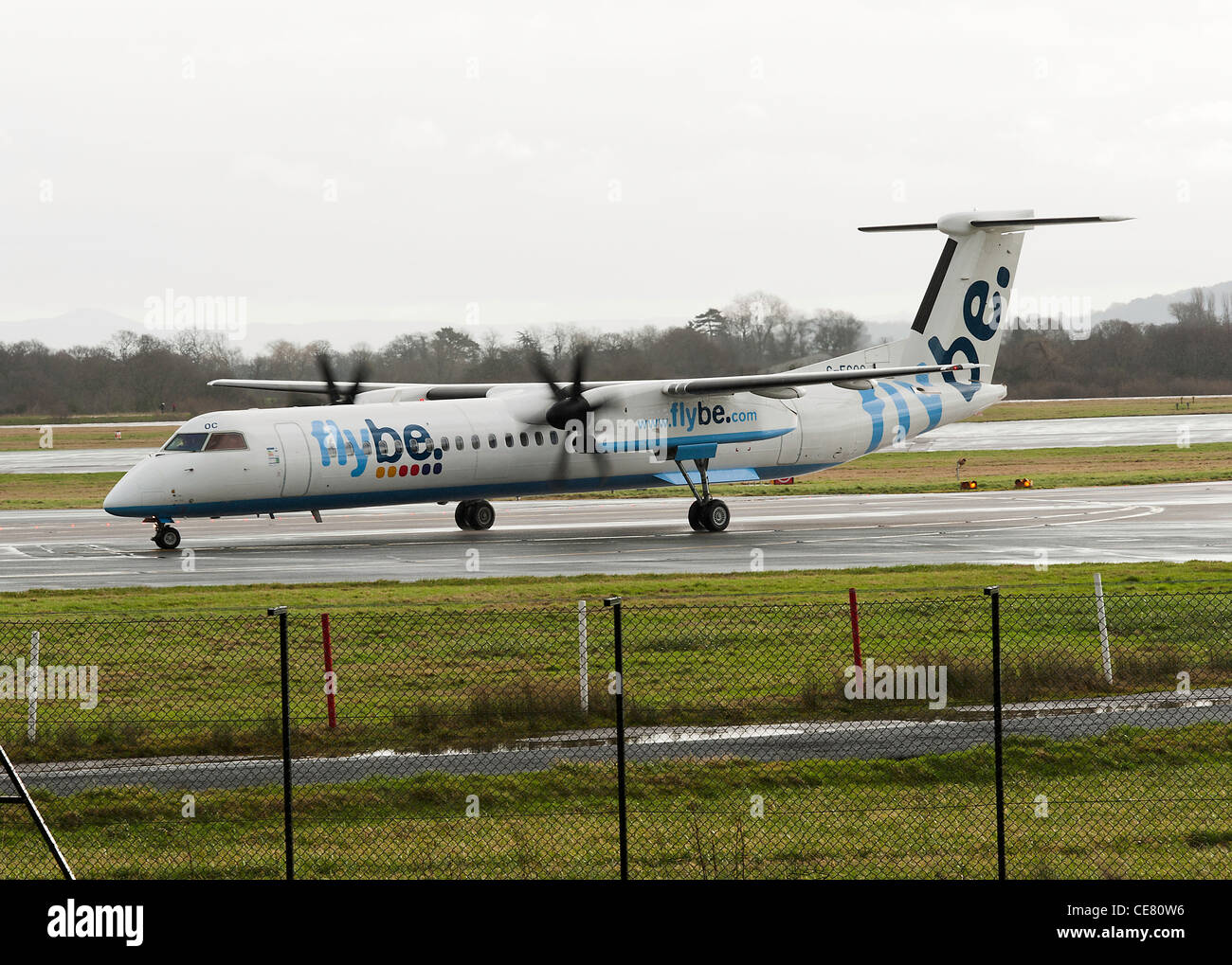 Flybe Airlines Bombardier DHC-8-402 Q400 Airliner G-ECOC Taxiing at Manchester International Airport England United Kingdom UK Stock Photo