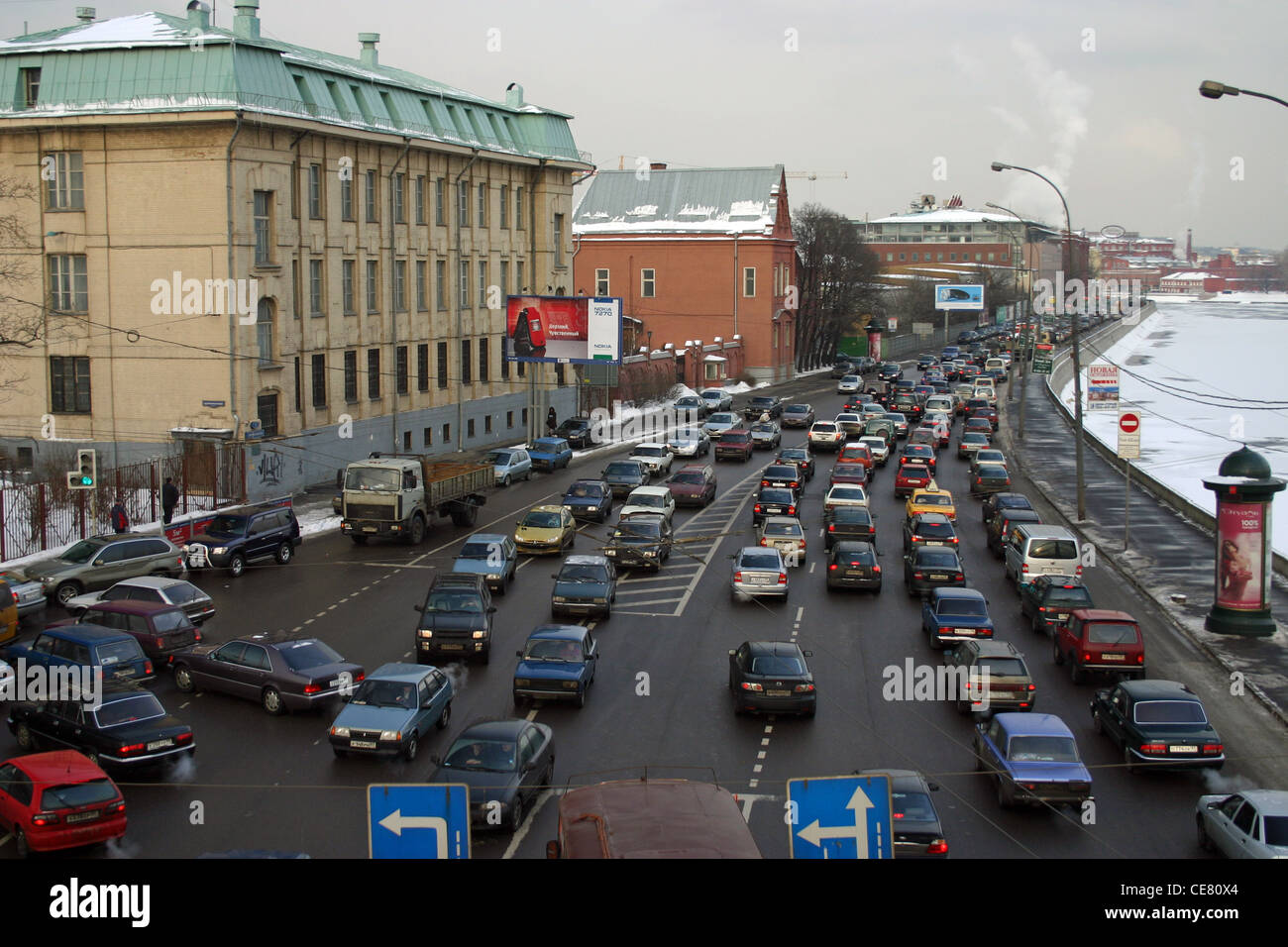 Traffic in downtown Moscow with the frozen Moskva River on the right hand side Stock Photo