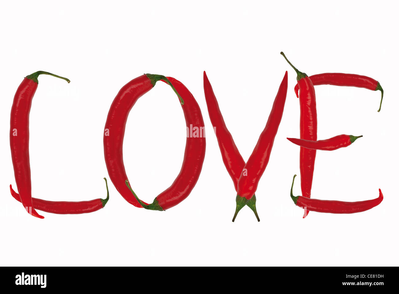 inscription love made from red chili peppers isolated on white background Stock Photo