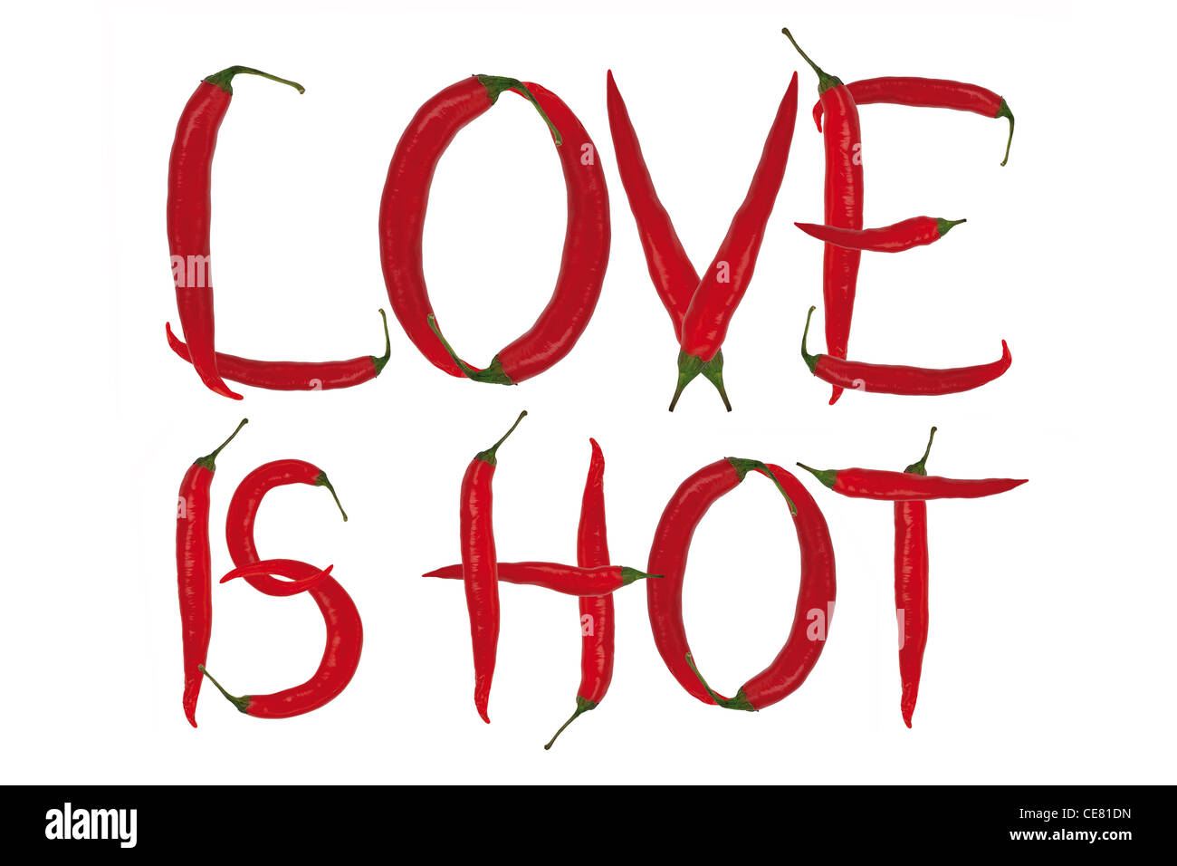 inscription love is hot made from red chili peppers isolated on white background Stock Photo