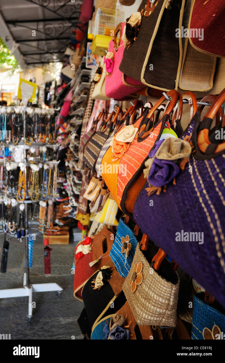 A colourful collection of bags on sale at a shop in Rhodes Market Stock