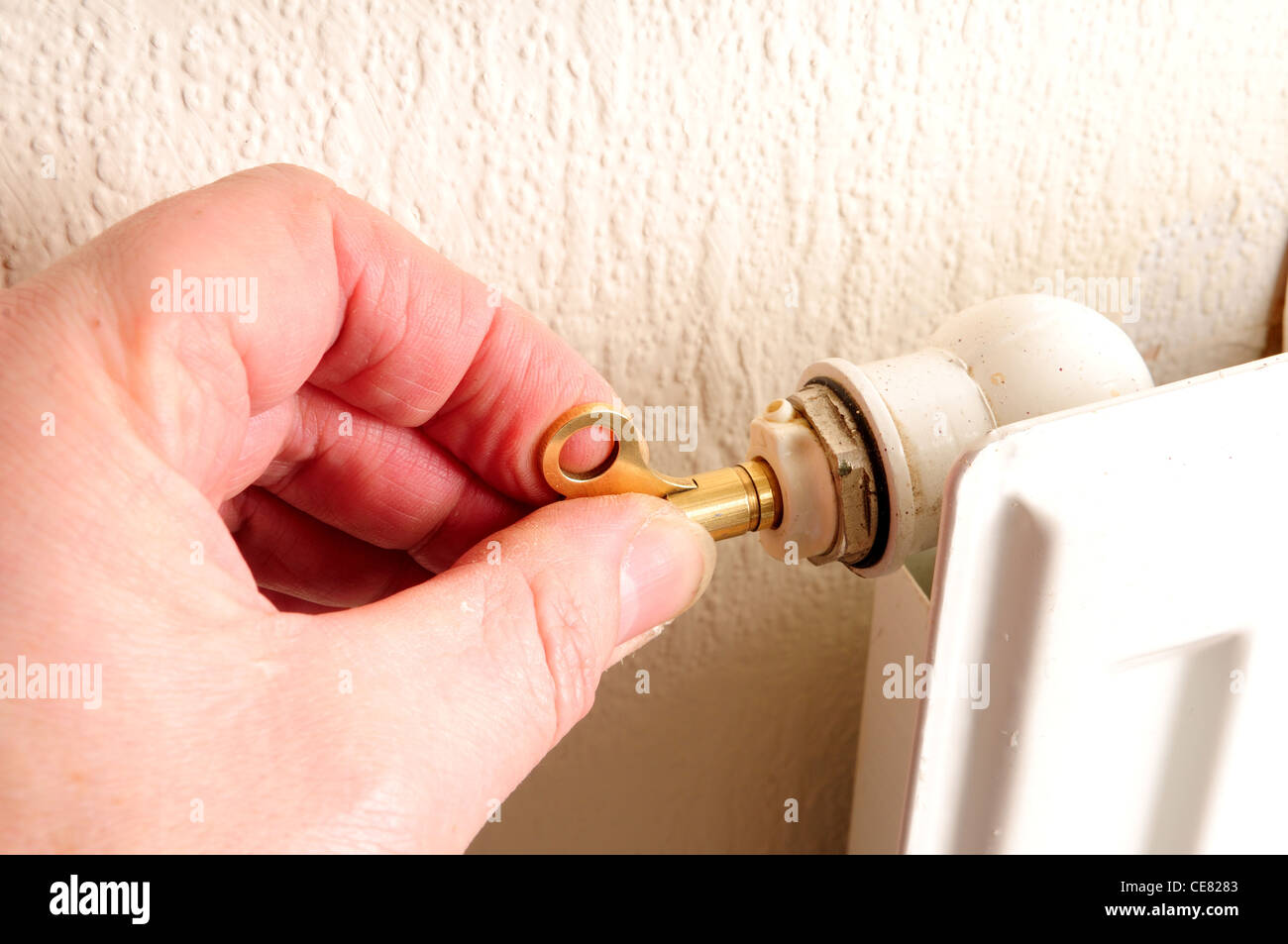 Bleeding A Radiator .Central Gas Heating Stock Photo Alamy