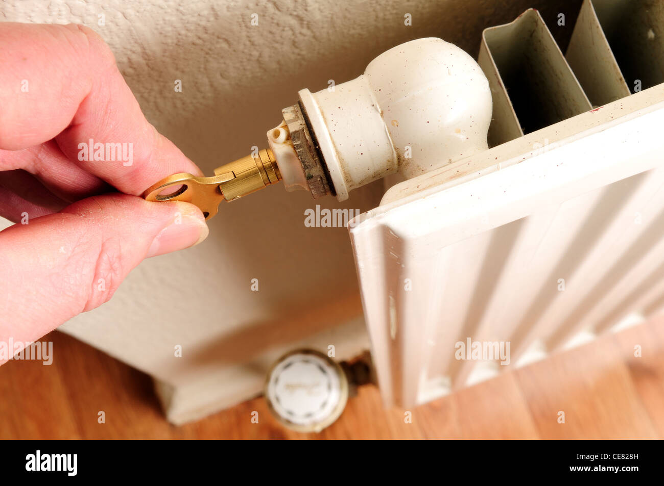 Bleeding A Radiator .Central Gas Heating Stock Photo Alamy