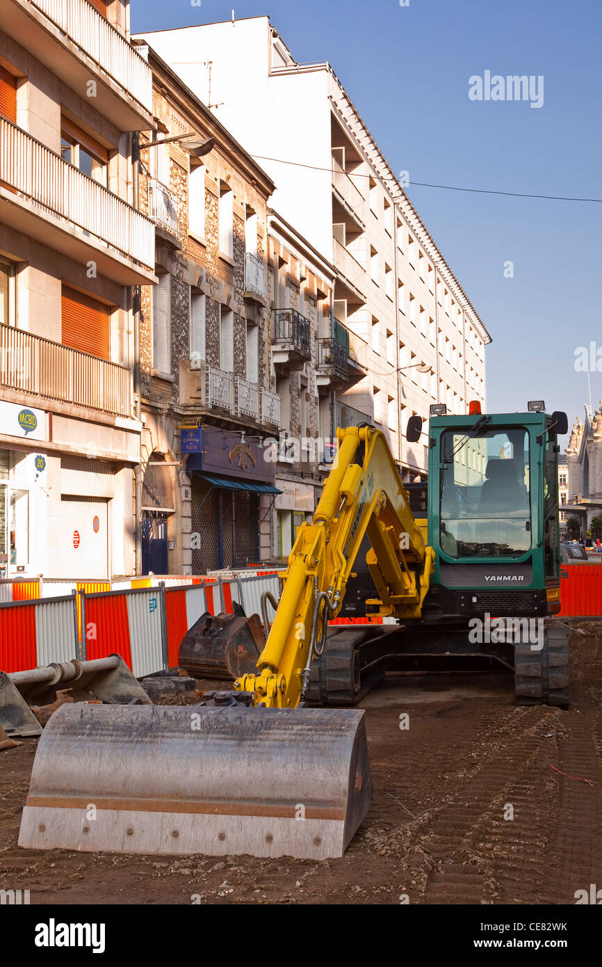 A digger stands idle on a building site Stock Photo Alamy