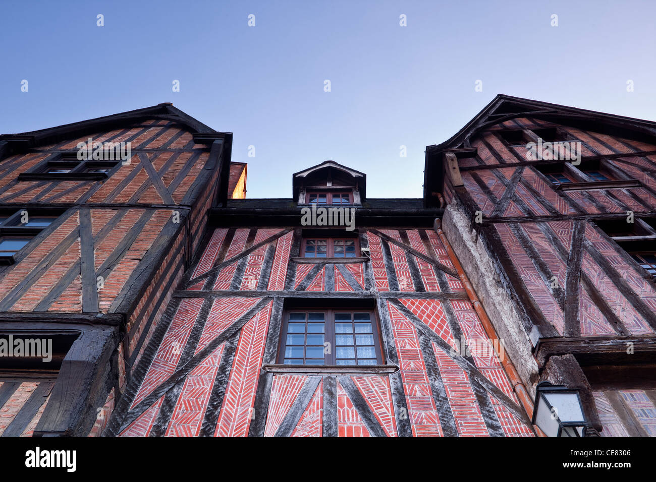 Looking up at one of the wood beamed houses at Place Plumereau in Tours, France. Stock Photo