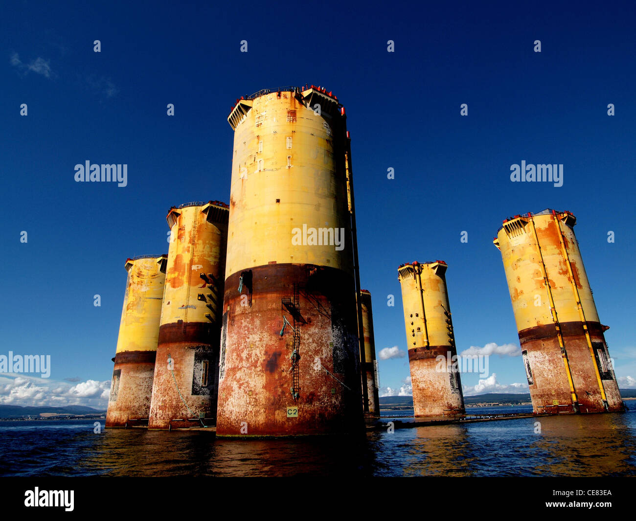 The hull of the Hutton TLP stacked in the Cromarty Firth. A redundant Oil Platform looking for a new use. Stock Photo