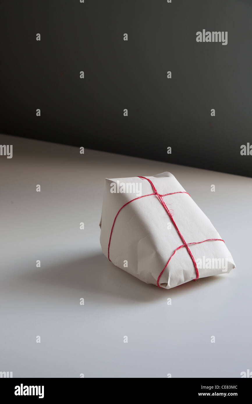 Triangular Wrapped Simple package hi-res stock photography and images - Alamy