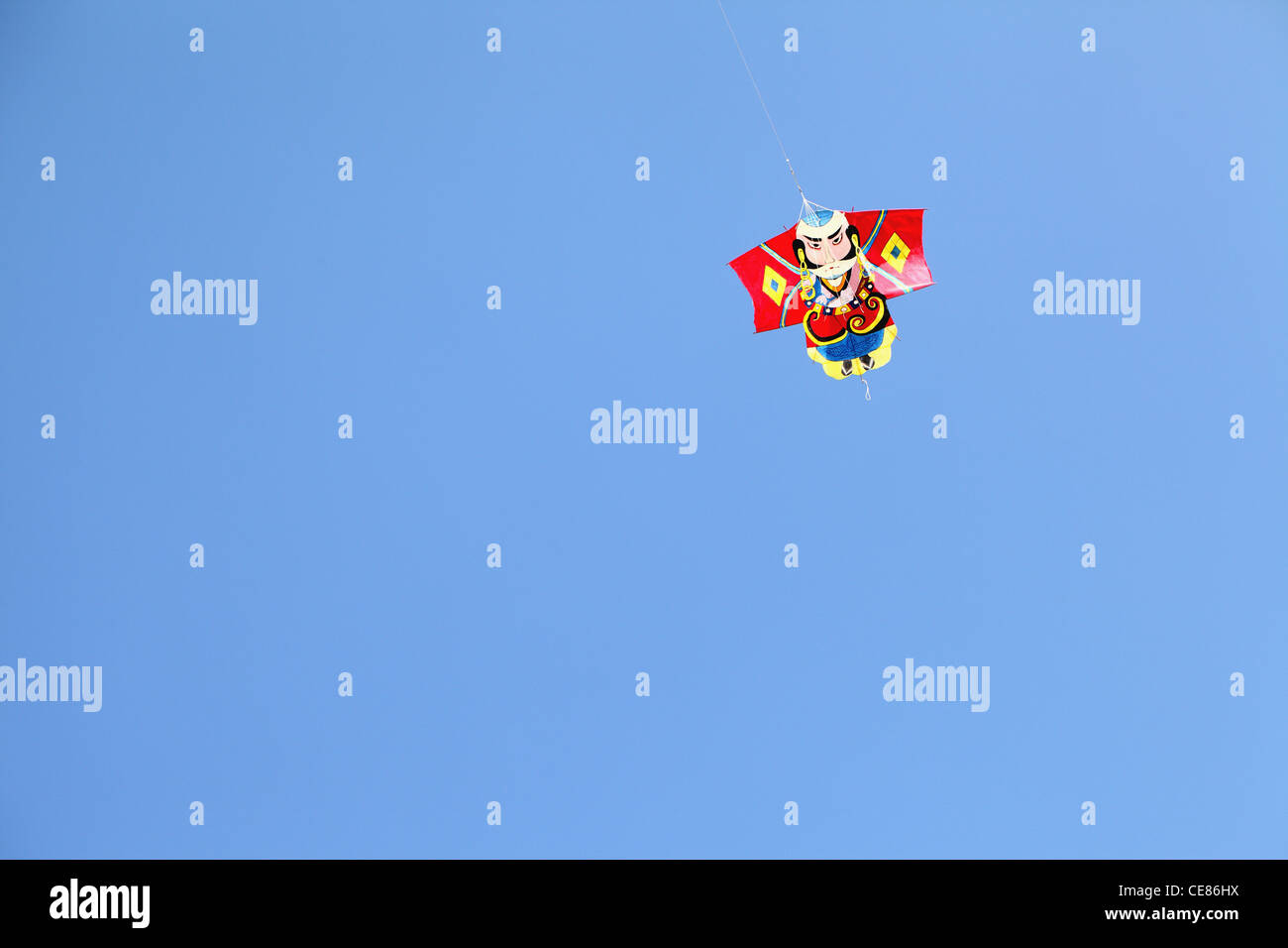 Japanese paper kite in blue sky Stock Photo Alamy