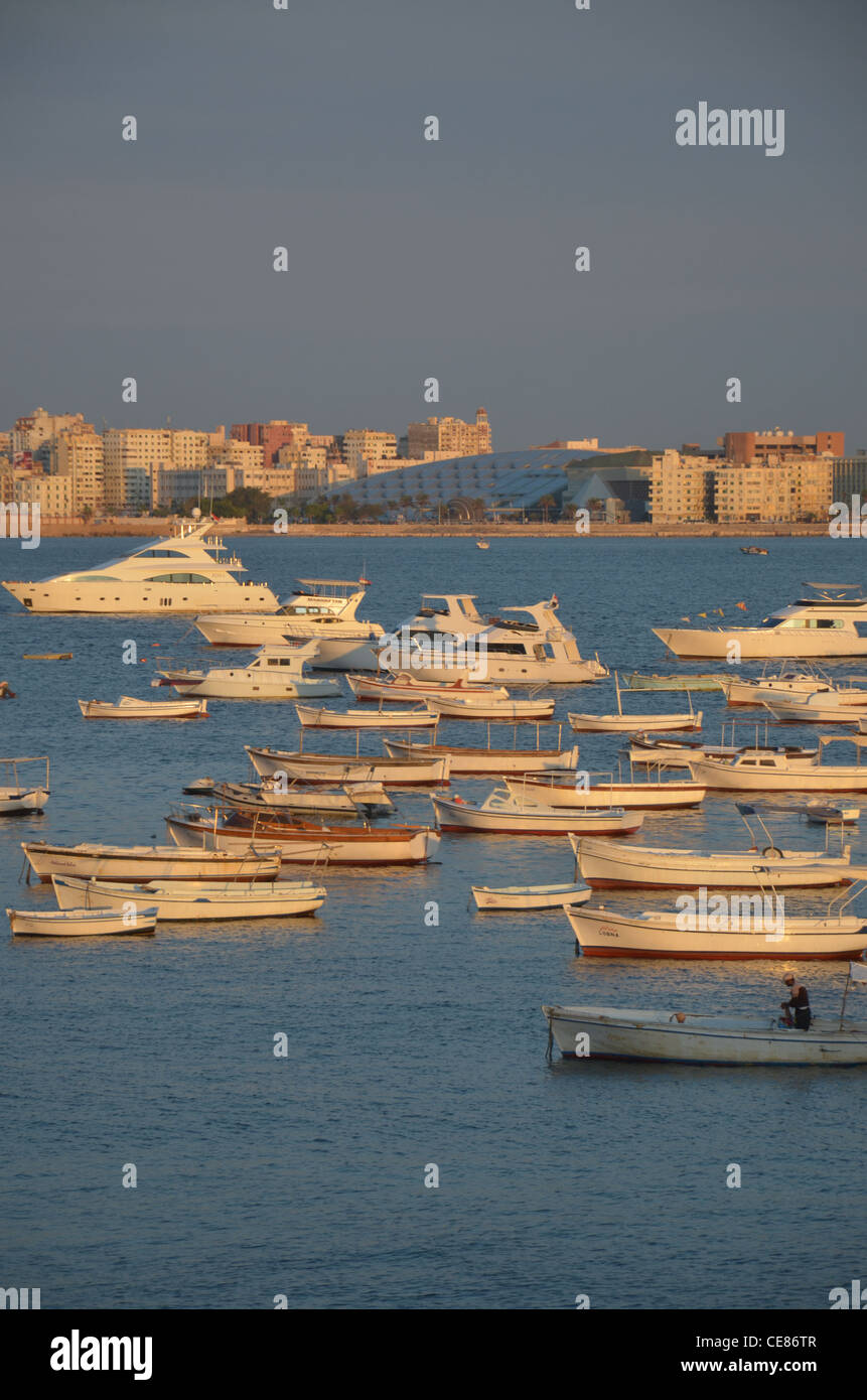 The Mediterranean seascape and skyline of Alexandria with the inner harbor in the foreground. Stock Photo