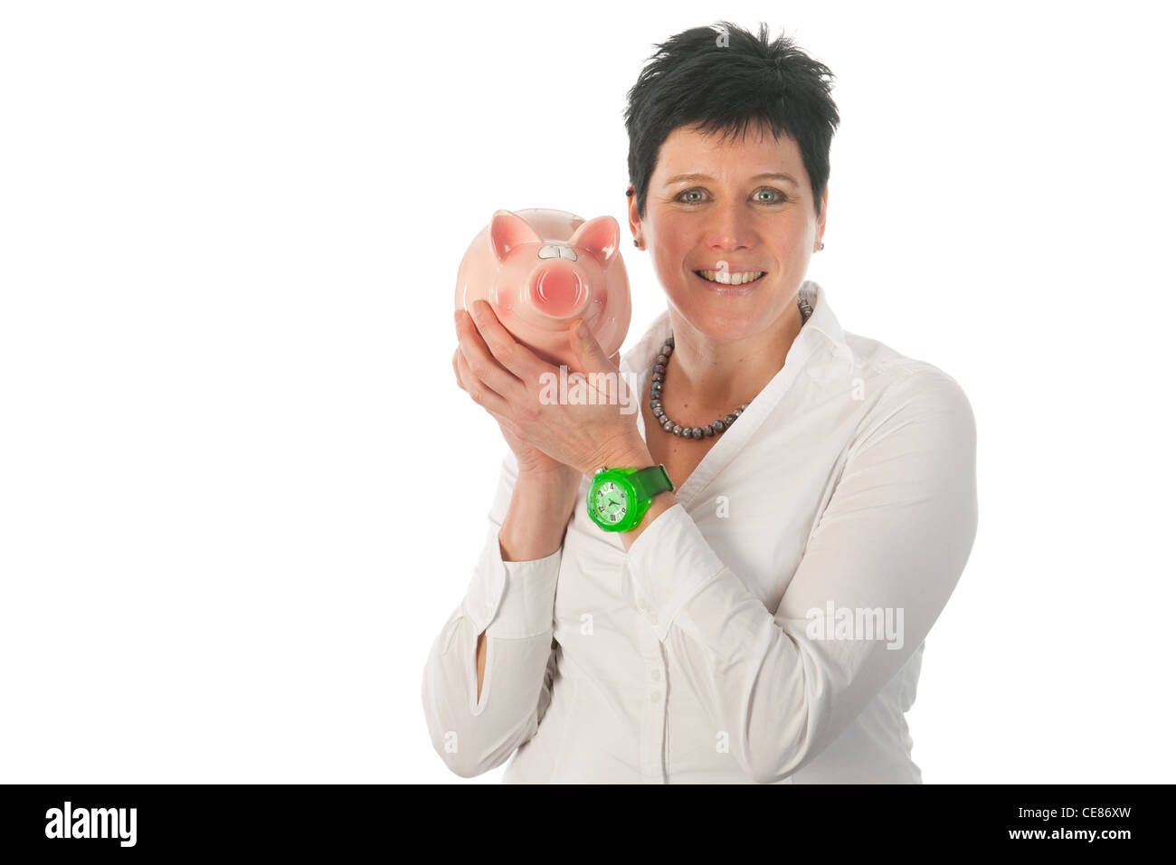 Young woman is holding a big piggy bank Stock Photo - Alamy