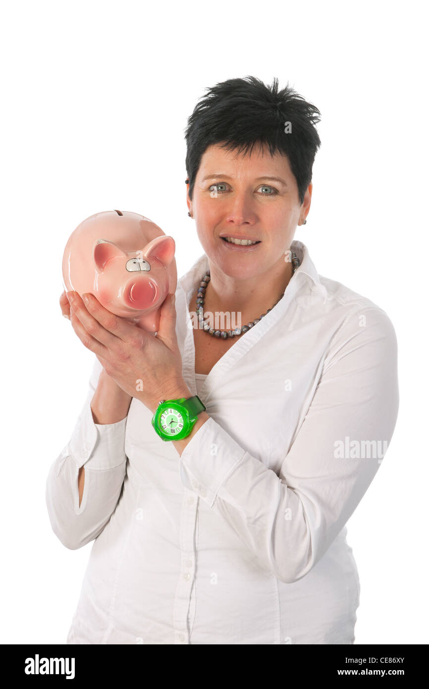 Young woman is holding a big piggy bank Stock Photo - Alamy