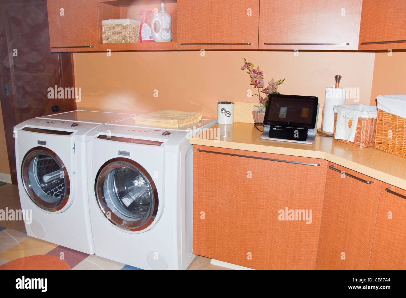 Laundry room with washer and dryer Stock Photo Alamy