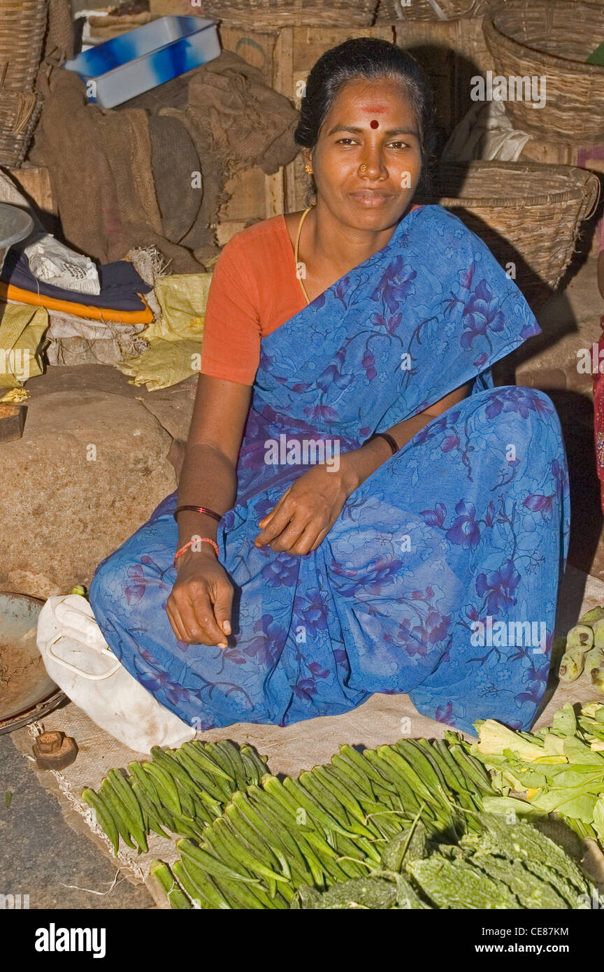 INDIA, Tamil Nadu, Pondicherry, woman selling vegetables at local