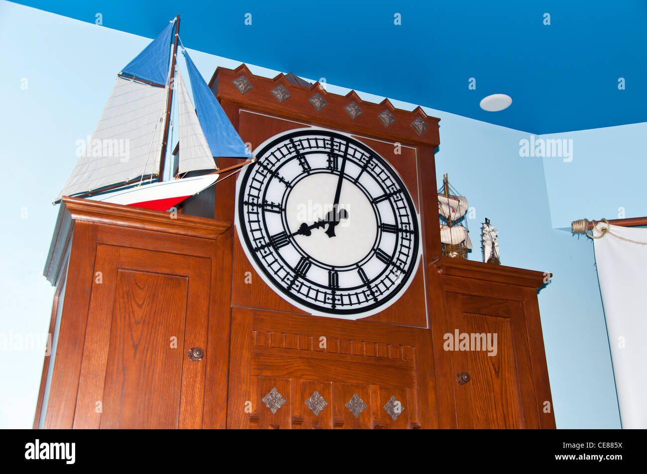 dresser with clock Stock Photo Alamy