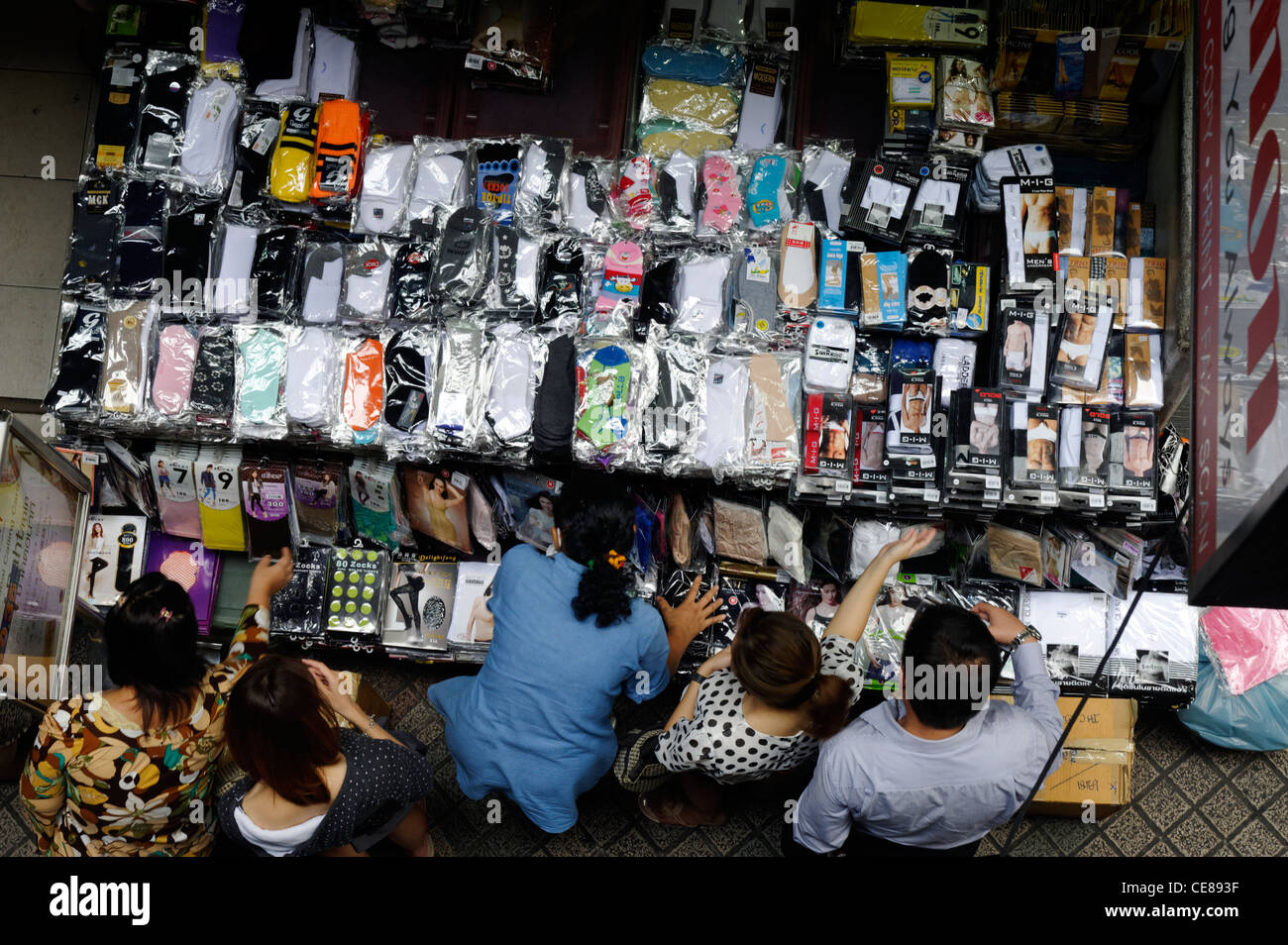 High view of a street market stall selling mens shirts and underwear in  Bangkok Stock Photo - Alamy