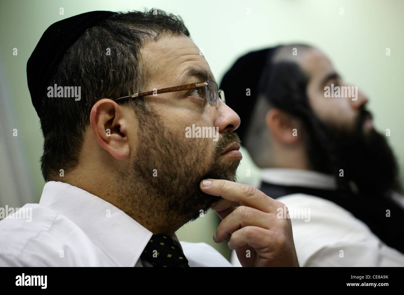 Orthodox Jewish Men Attending A Lecture In Israel Stock Photo