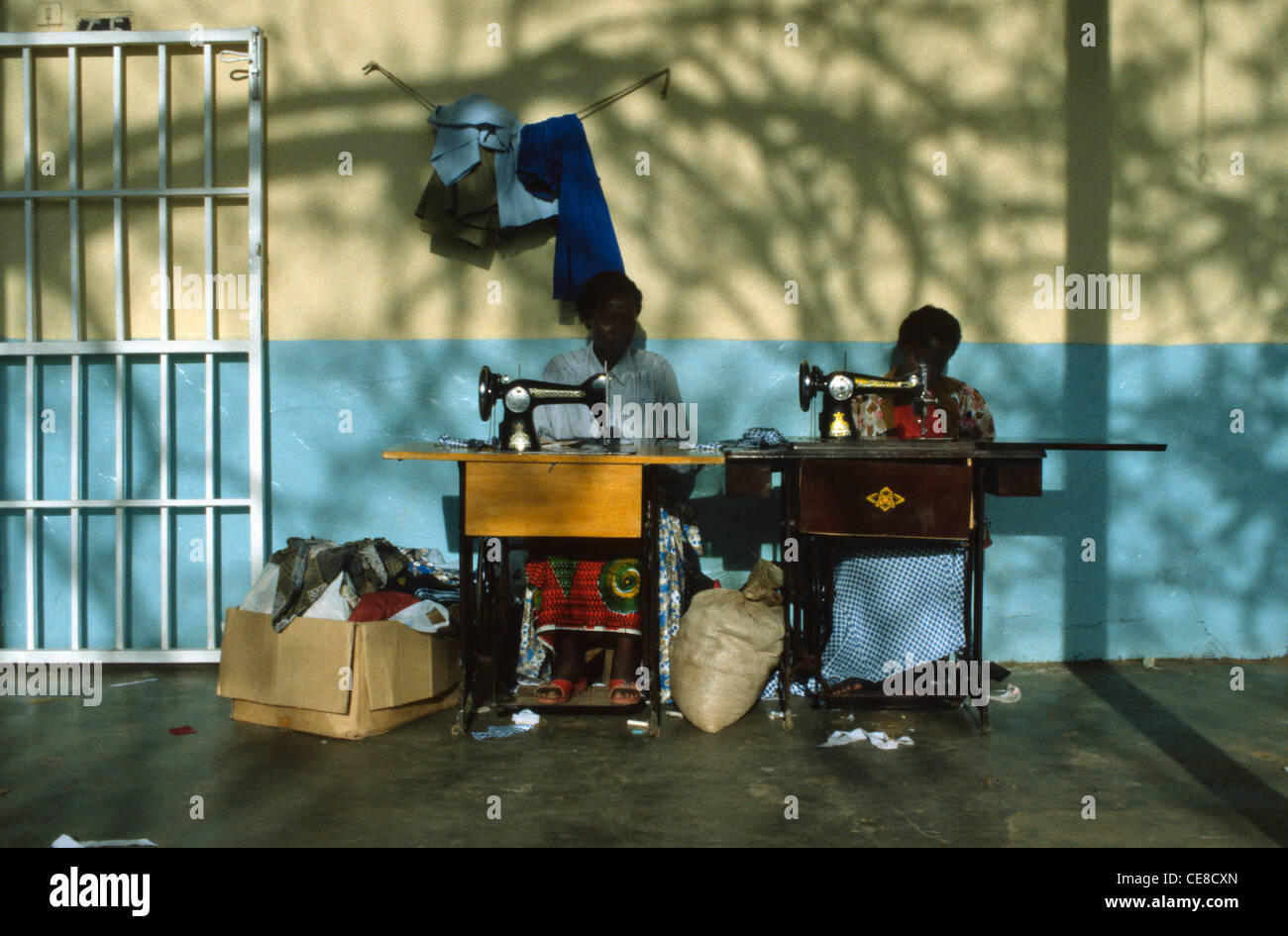Woman using old Singer sewing machine in Rwanda, Africa Stock Photo Alamy