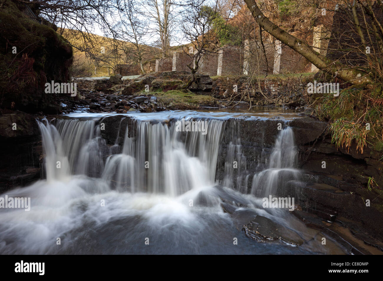 Waterfall on Middlehope Burn With the Bouseteems of Slit Mine Behind Slit Wood Westgate in Weardale County Durham UK Stock Photo