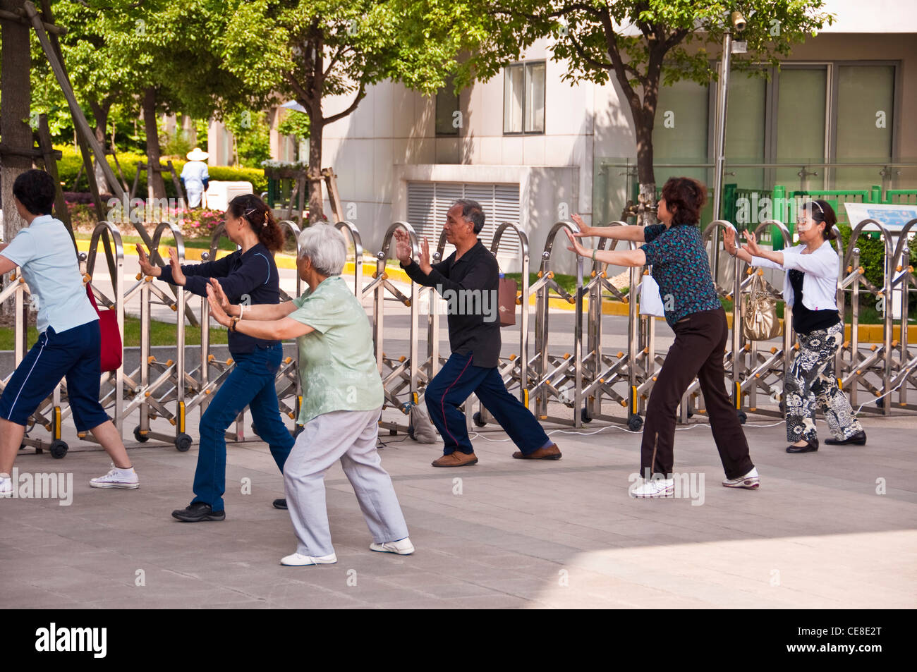 A group of old people practising taichi in Shanghai - China Stock Photo