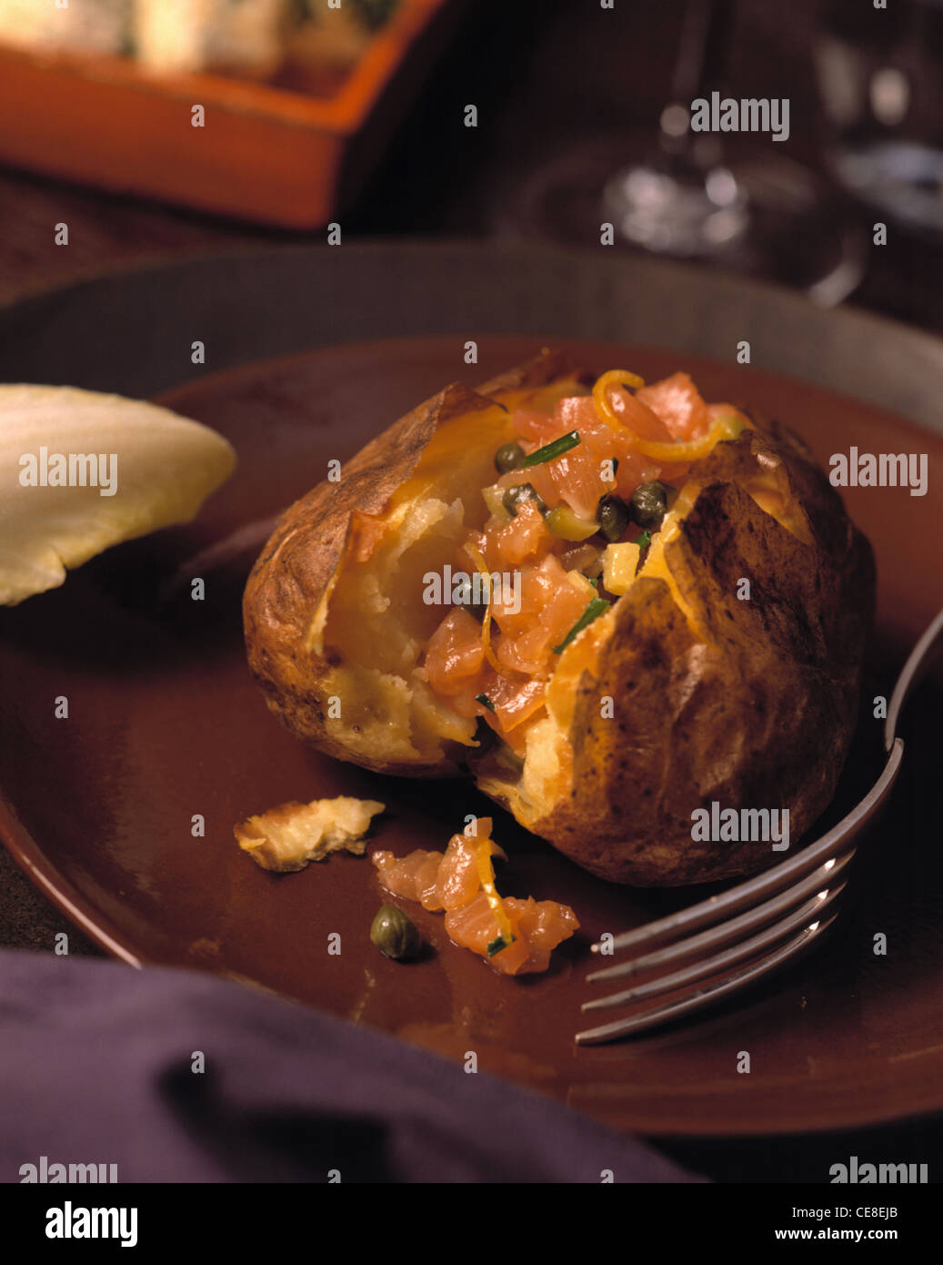 Baked potatoes mit salmon tartar Stock Photo - Alamy