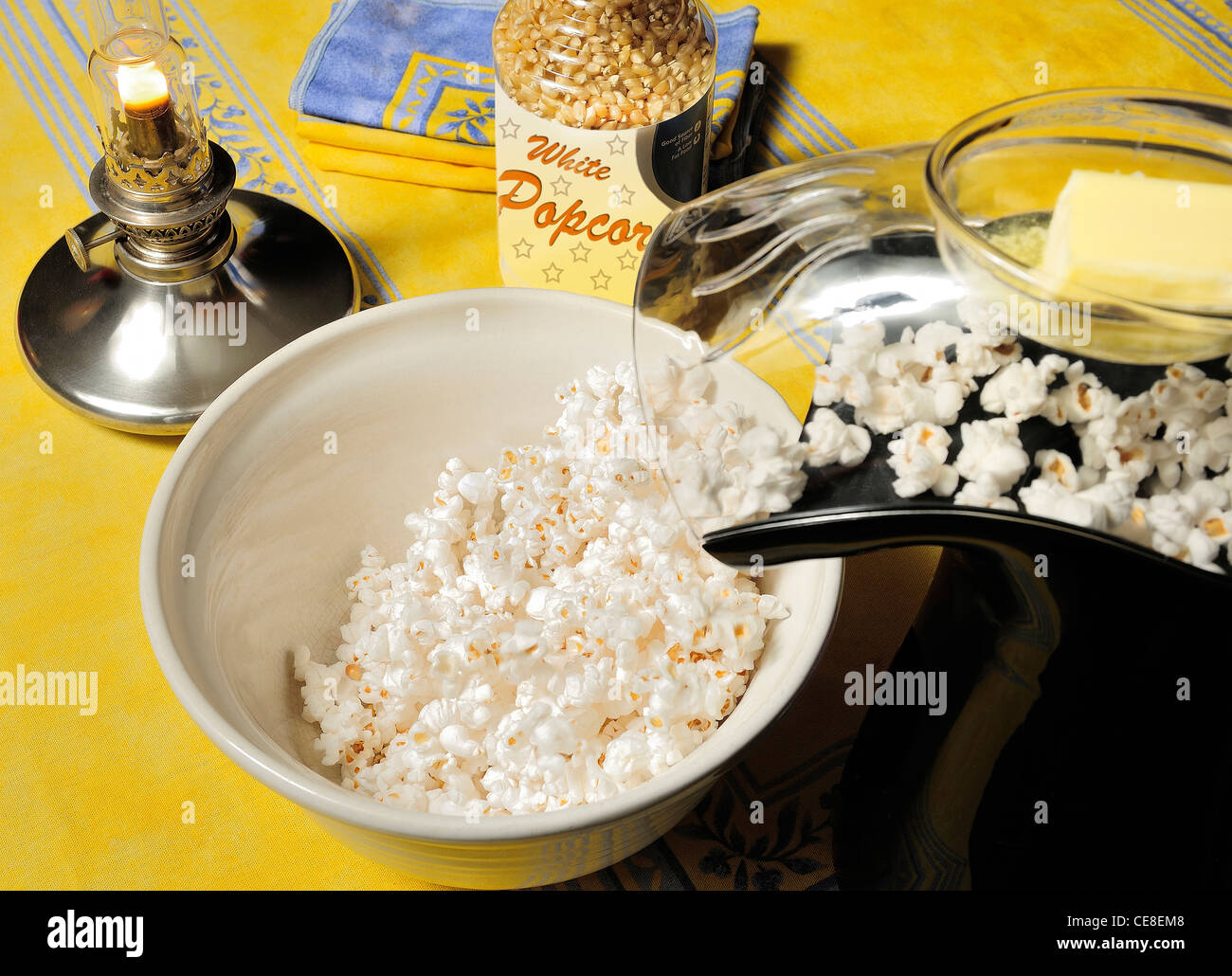 Air popped white popcorn and melting butter Stock Photo Alamy