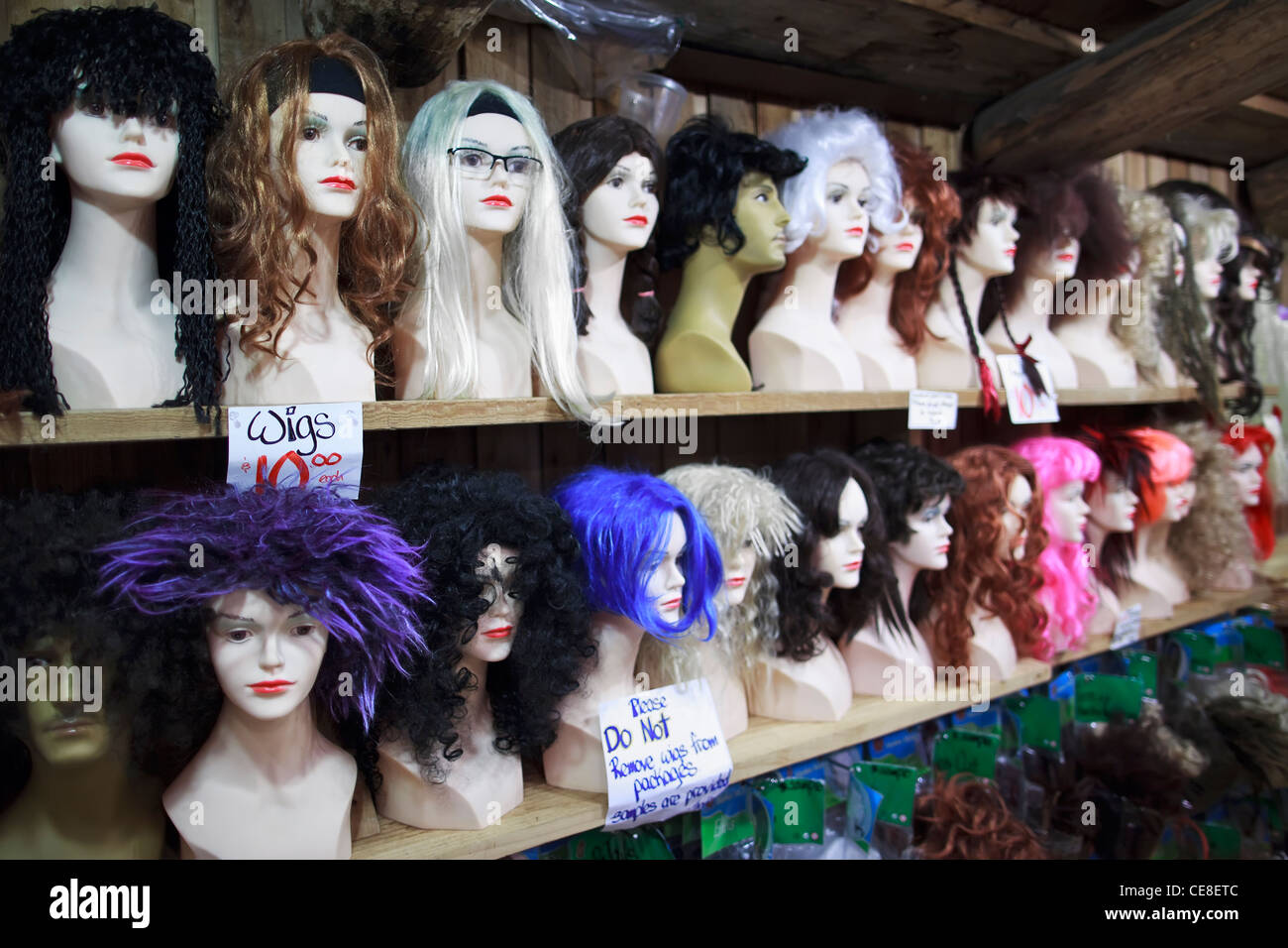 Wigs on mannequin heads. Stock Photo