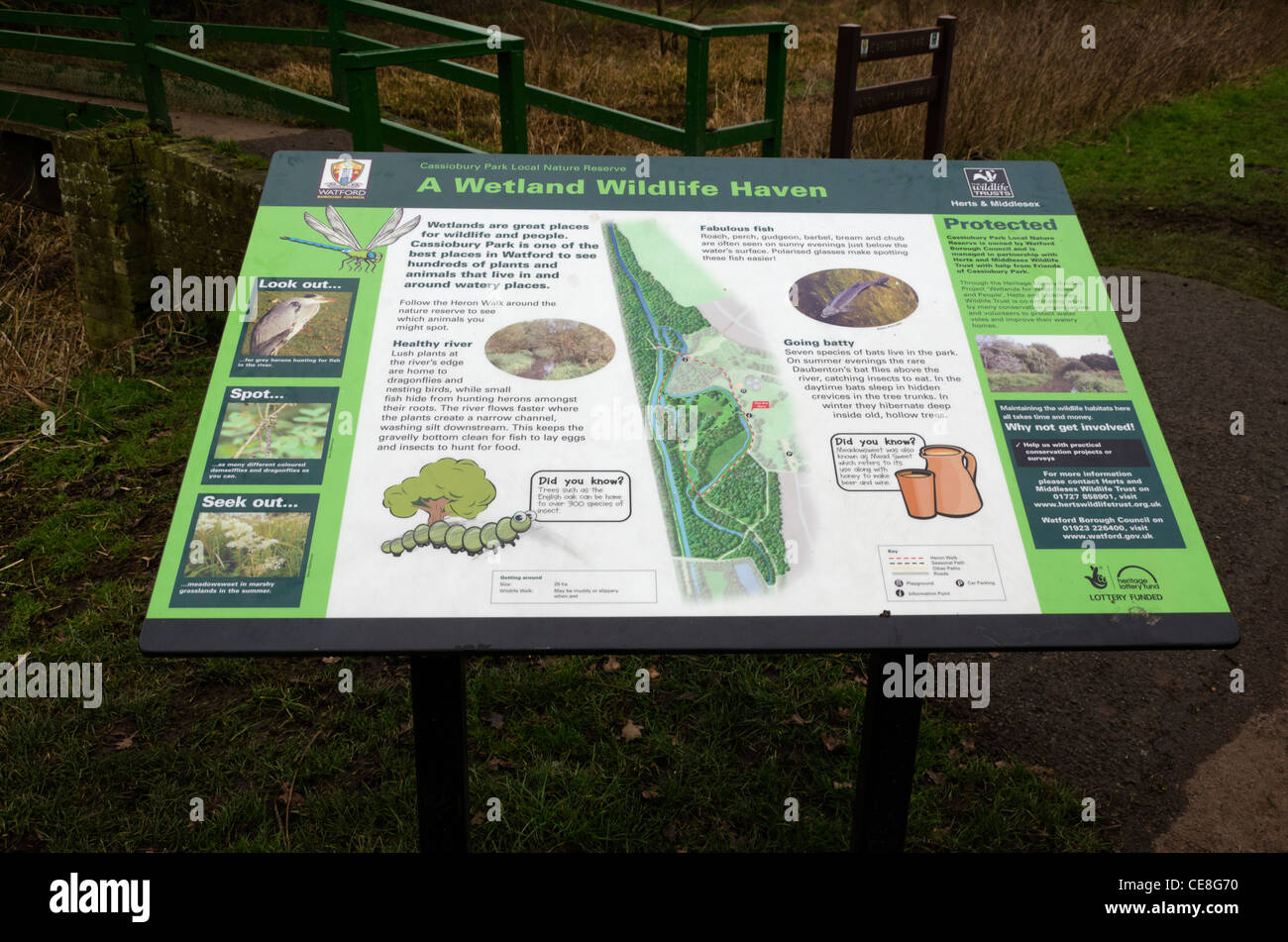 Public notice, guide, information board and map of Cassiobury public Park Watford Herts UK Stock Photo