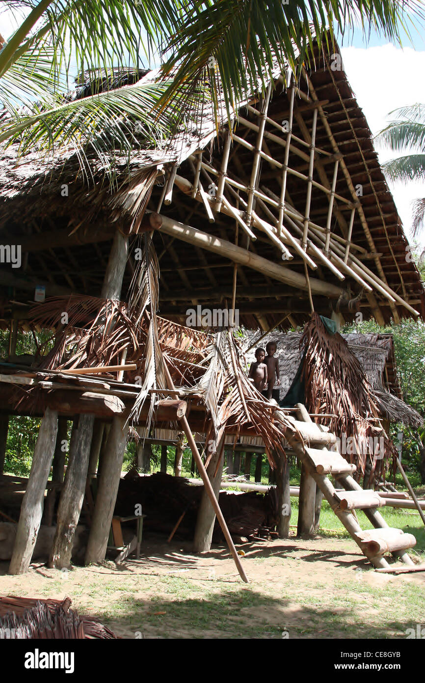 Traditional Sepik Stilt House in a Remote Papua New Guinea Village Stock Photo