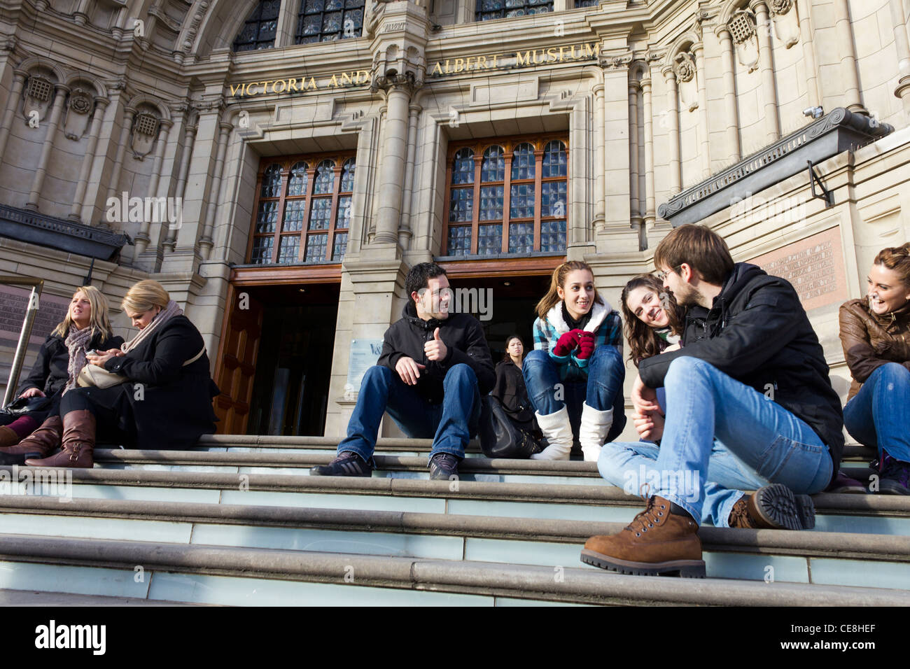 youths on the steps of the Victoria and Albert Museum, London, England, UK Stock Photo
