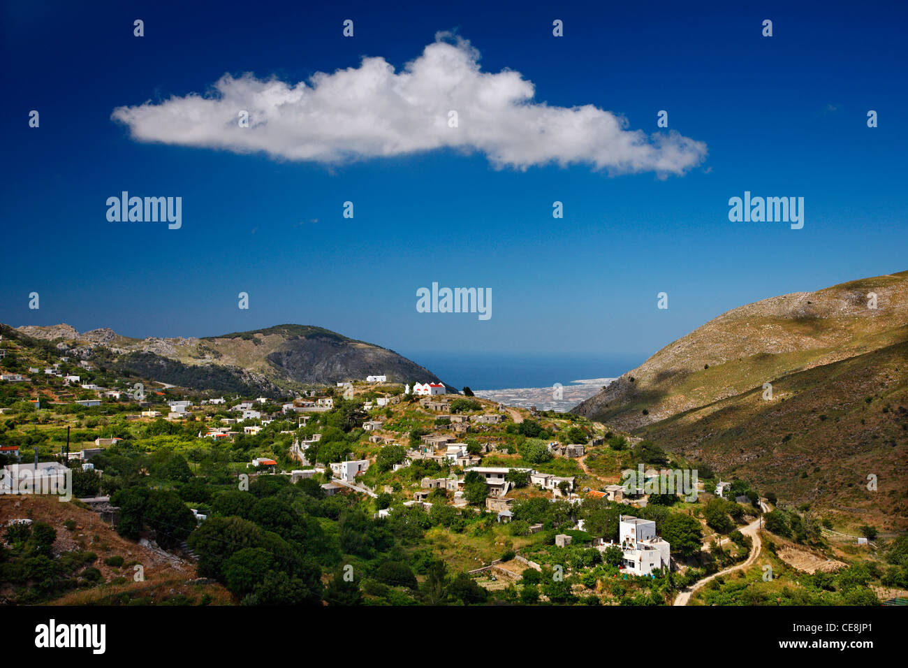 Trypti , a beautiful mountainous village, close to Ierapetra town (which you can see in the BG), Lasithi, Crete, Greece Stock Photo