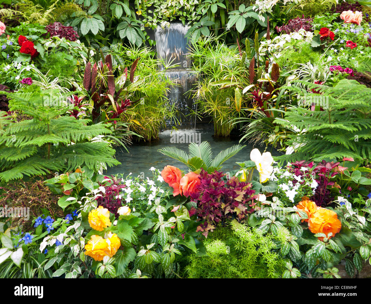A waterfall and pond in Butchart Gardens Victoria Vancouver Island in Canada Stock Photo