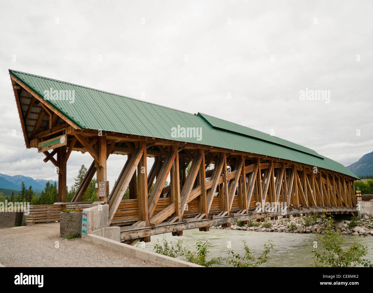Kicking Horse Pedestrian Bridge in Golden is the longest authentic covered timber frame bridge in Canada Stock Photo