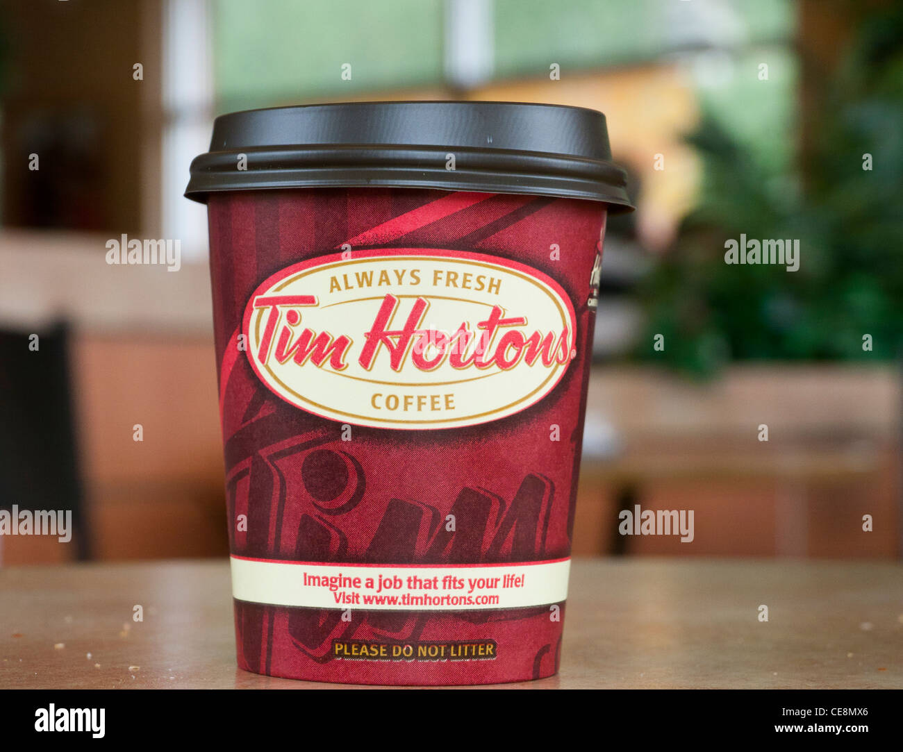 Tim Hortons coffee cup inside a restaurant in Canada Stock Photo