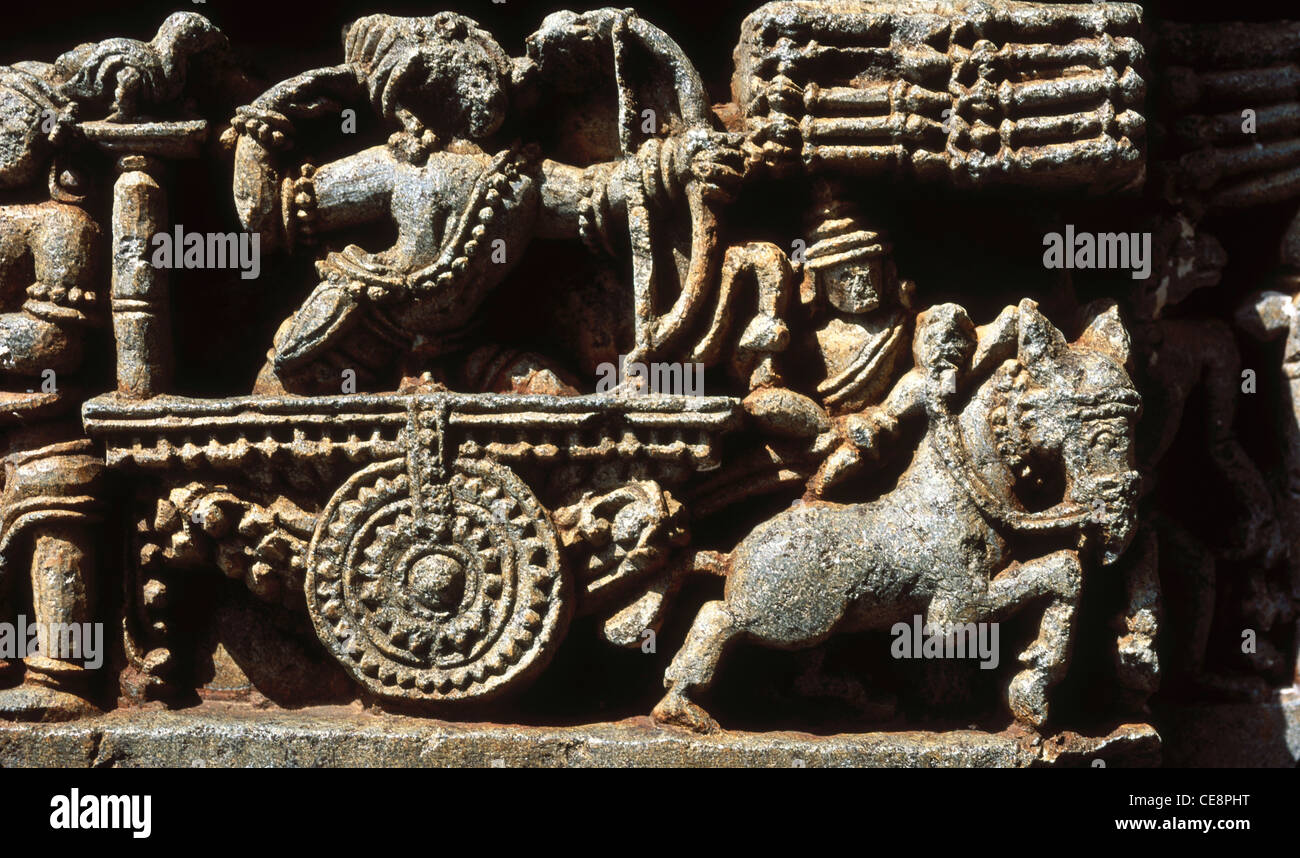 MAA 81242 : mahabharat sculpture Arjuna with bow and arrow in chariot in hoysalaswara temple halebid karnataka india Stock Photo