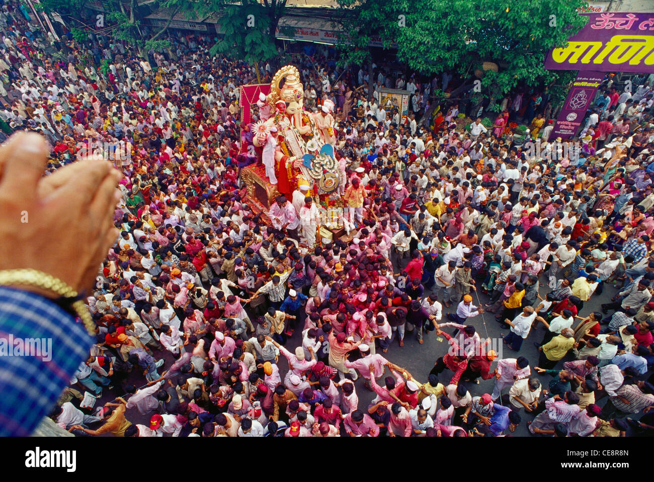 SOA 81433 : crowd at Ganesh ganpati Festival Elephant head Lord procession ; lalbaug ; bombay mumbai ; maharashtra ; india Stock Photo