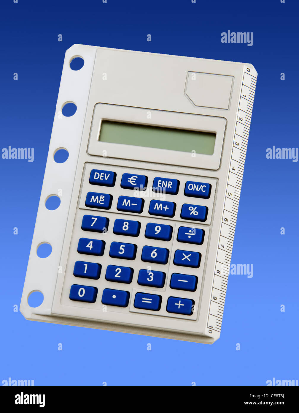 Mini calculator for folder on blue Stock Photo