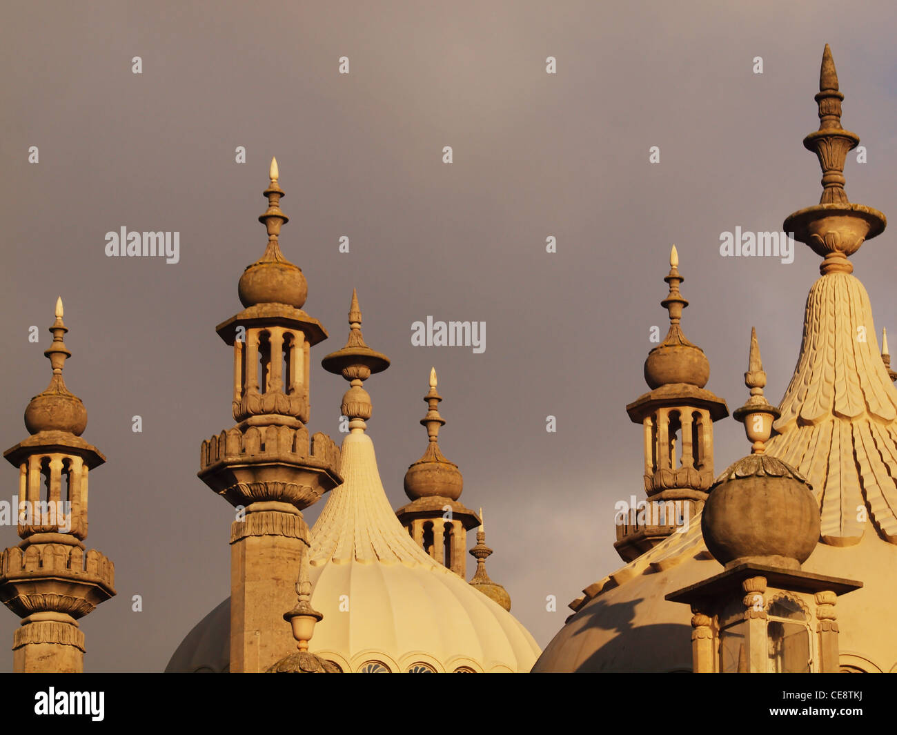 The domes, spires and turrets of Brighton's Royal Pavilion set against a stormy sky. Stock Photo