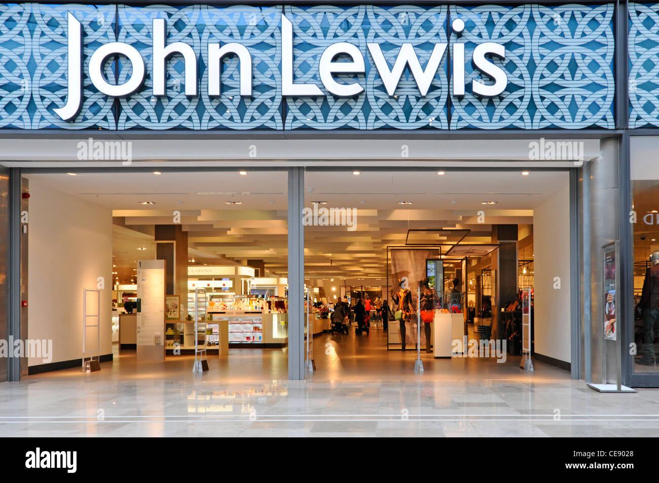 John Lewis department store entrance and interior from shopping mall at the Stratford City Westfield shopping centre Stock Photo