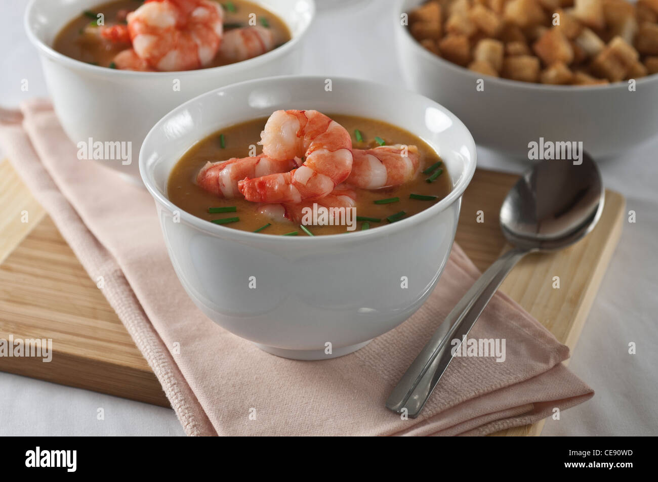 Seafood bisque with croutons. Prawn shrimp shellfish soup. Stock Photo