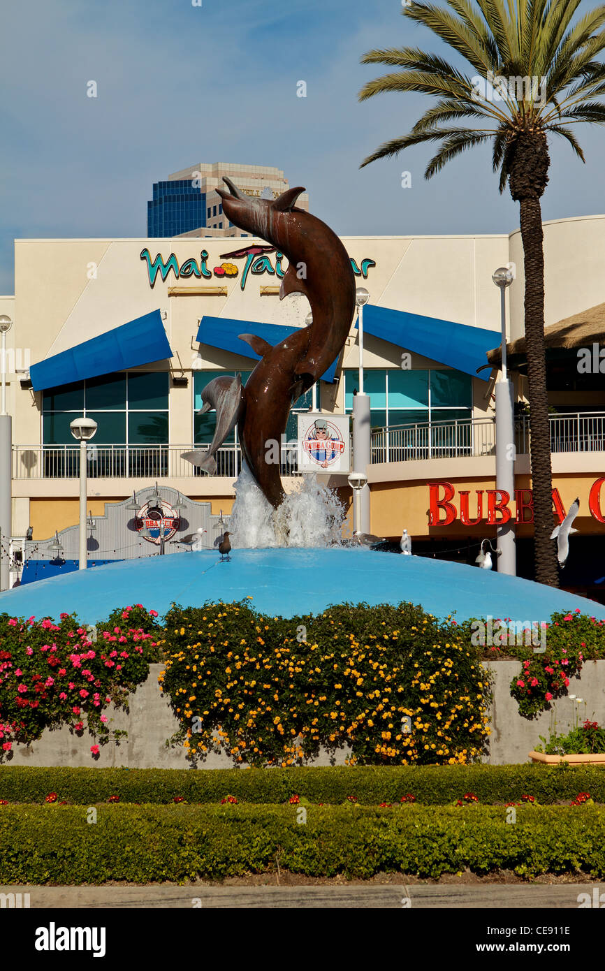 Dolphin water fountain at rainbow harbor long beach California Stock Photo