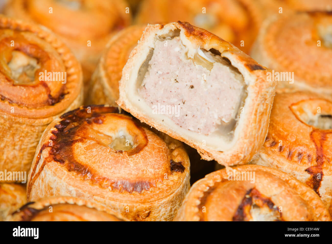 A traditional British pork pie on display at a local indoor market in England Stock Photo