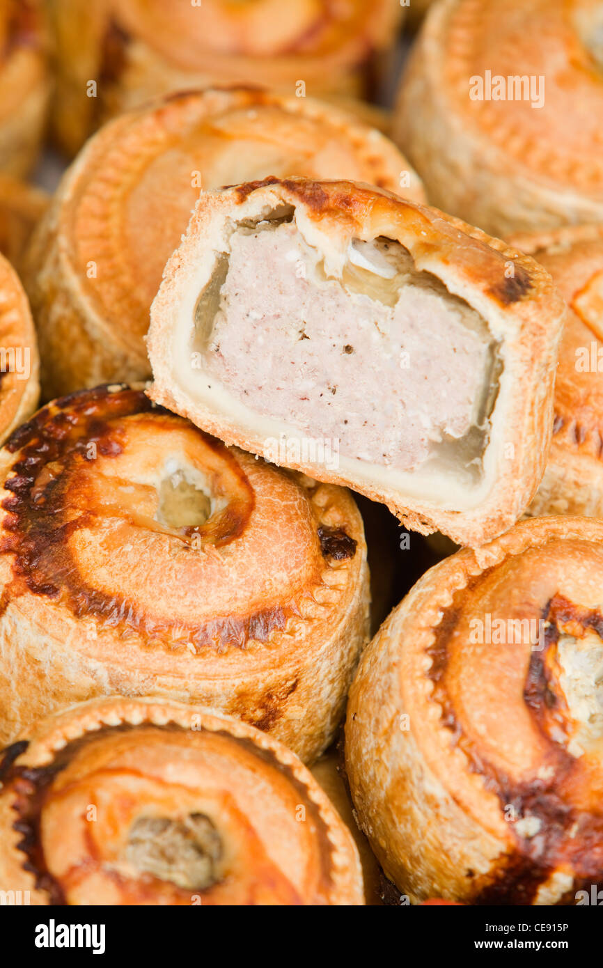 A traditional British pork pie on display at a local indoor market in England Stock Photo