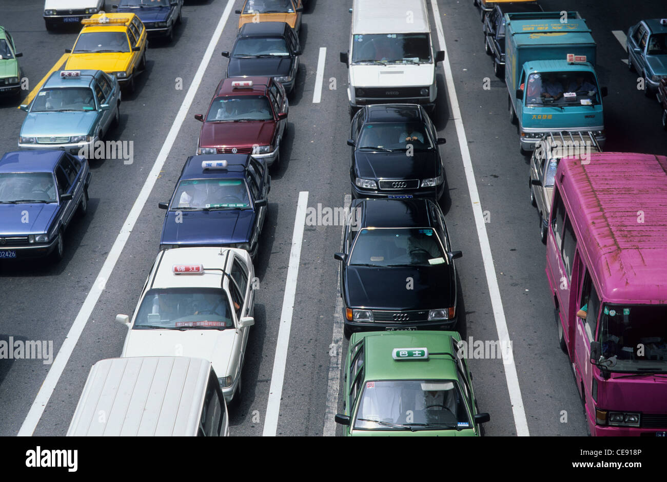 China, Shanghai, traffic at a standstill showing some locally made cars e.g. VW Santana, Audi 100. Stock Photo