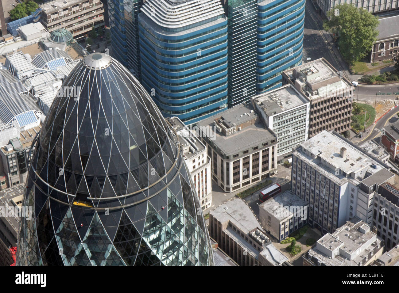 Aerial view of 30 St Mary Axe, The Gherkin building, a London Landmark with the blue St Botolph Building in the background Stock Photo