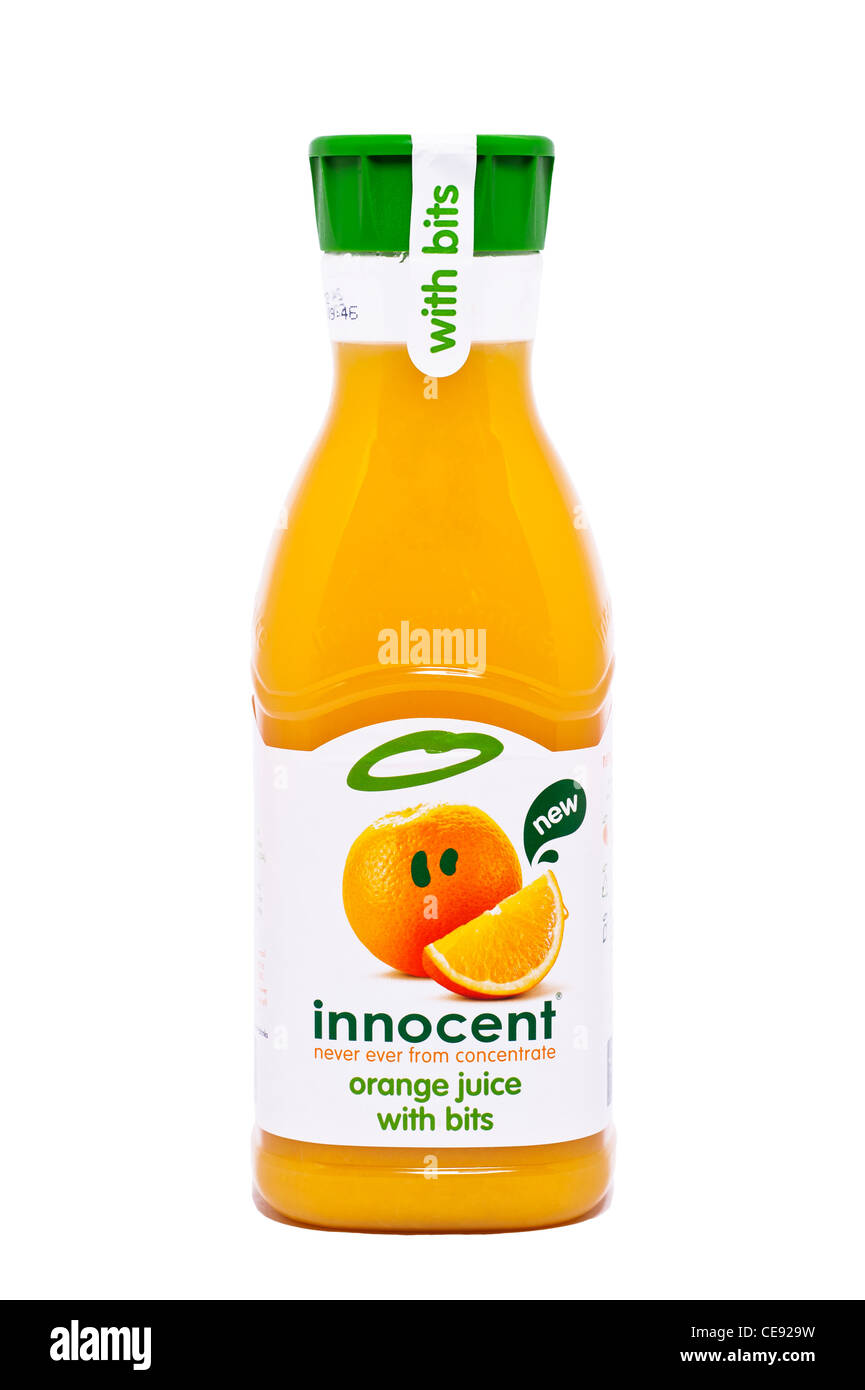A bottle of innocent orange juice with bits on a white background ...