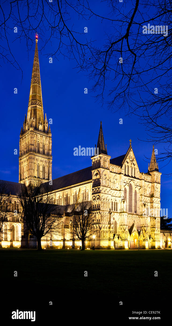 The floodlit west front and spire of medieval Salisbury Cathedral, Wiltshire, England, UK at twilight. Stock Photo